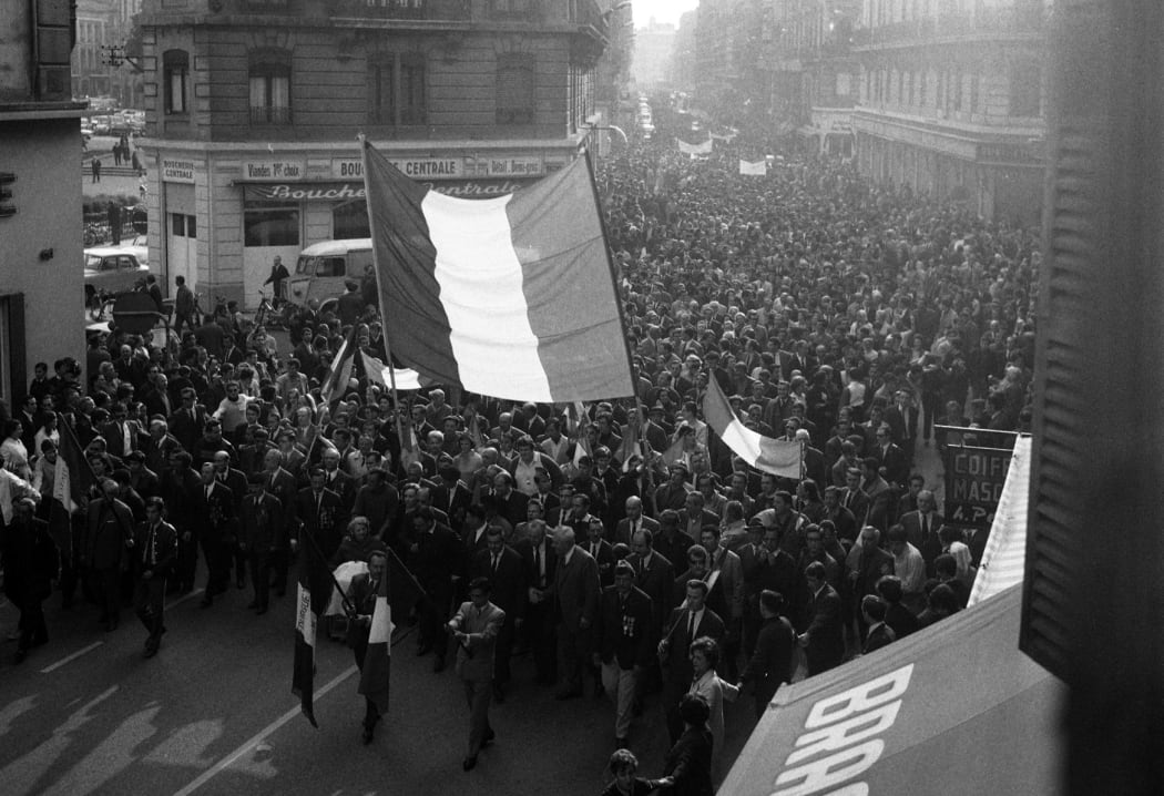 French protesters march down Rue de Toulouse, 1968.