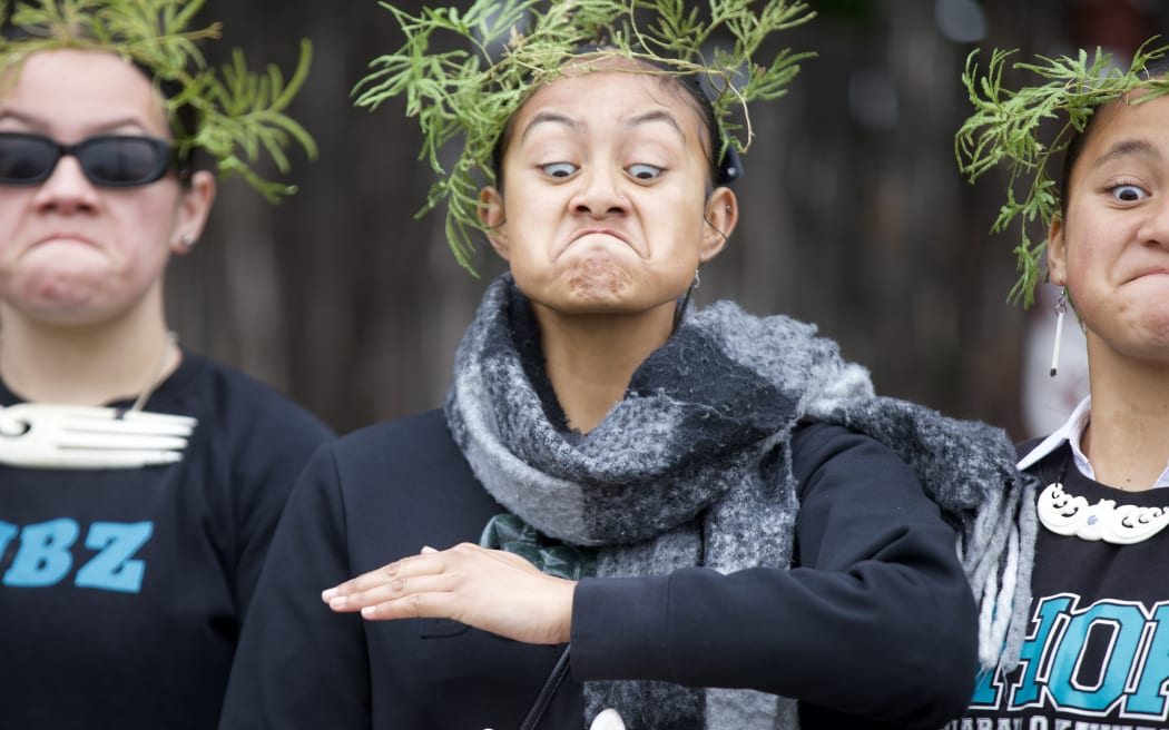 A powerful pūkana by a rangatahi mourner as she awaits to pay respects to Kiingi Tuheitia.