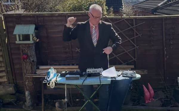 Nick Hayes laying down industrial ironing board beats in his Yorkshire back yard.