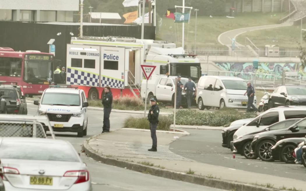 Police teams are at the scene of a deadly shooting at Sydney's Bondi Beach on 15 December following the attack on 14 December.