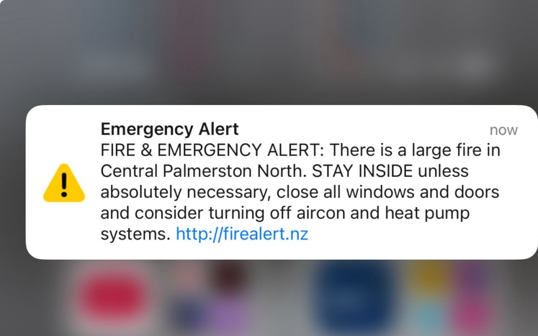 A safety warning sent by Fire and Emergency NZ as a large fire burned through the old Fitzherbert pub, in Ferguson Street, Palmerston North, on 30 October, 2025.