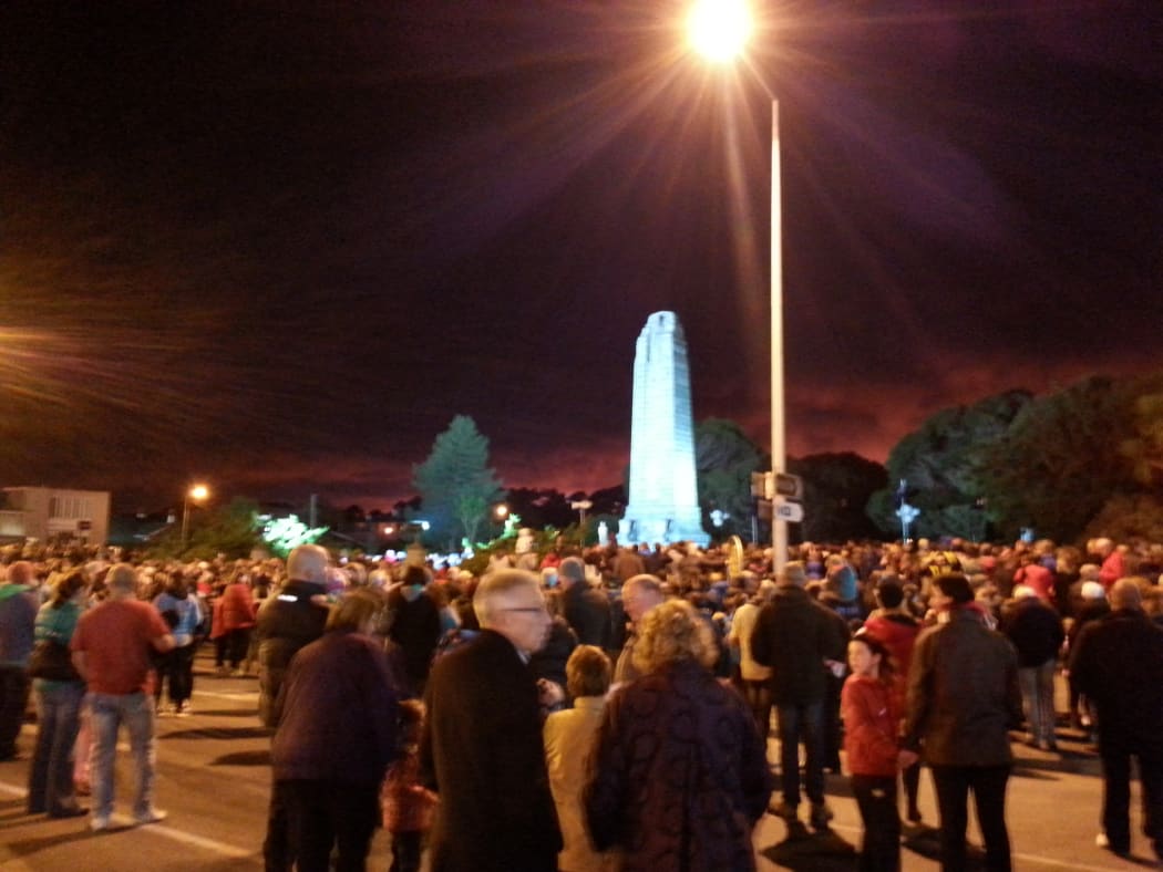 Crowds gather for the dawn service at the cenotaph in Invercargill.