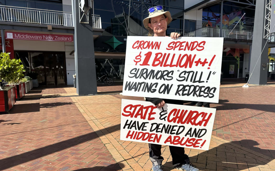 Protestor and advocate for survivors of abuse in care refused to watch NZ government apology which was broadcast to survivors in Wellington at Shed 6.