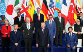 ROME, ITALY - OCTOBER 30: Turkish President Recep Tayyip Erdogan (C) and other participants pose for a family photograph within the G20 Leaders' Summit at Roma Convention Center La Nuvola in Rome, Italy on October 30, 2021.