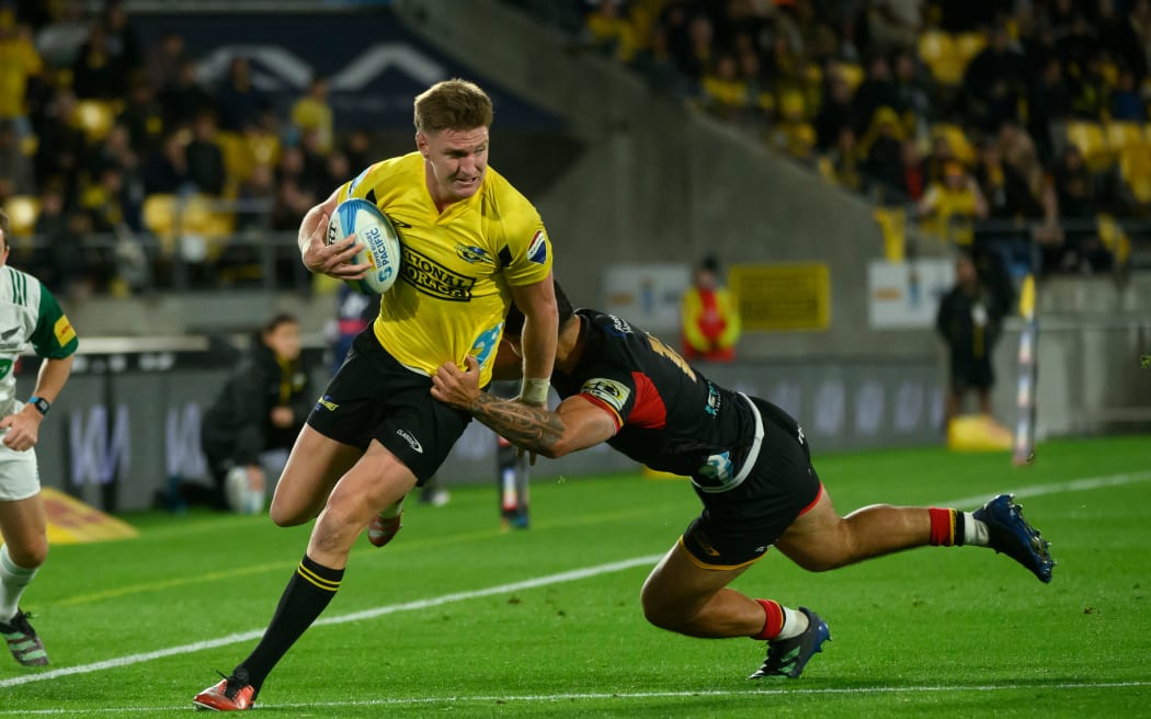 Jordie Barrett of the Hurricanes makes a run during Super Rugby Pacific, 2024.