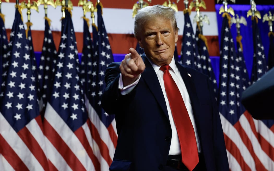 WEST PALM BEACH, FLORIDA - NOVEMBER 06: Republican presidential nominee, former U.S. President Donald Trump arrives to speak during an election night event at the Palm Beach Convention Center on November 06, 2024 in West Palm Beach, Florida. Americans cast their ballots today in the presidential race between Republican nominee former President Donald Trump and Vice President Kamala Harris, as well as multiple state elections that will determine the balance of power in Congress.   Chip Somodevilla/Getty Images/AFP (Photo by CHIP SOMODEVILLA / GETTY IMAGES NORTH AMERICA / Getty Images via AFP)