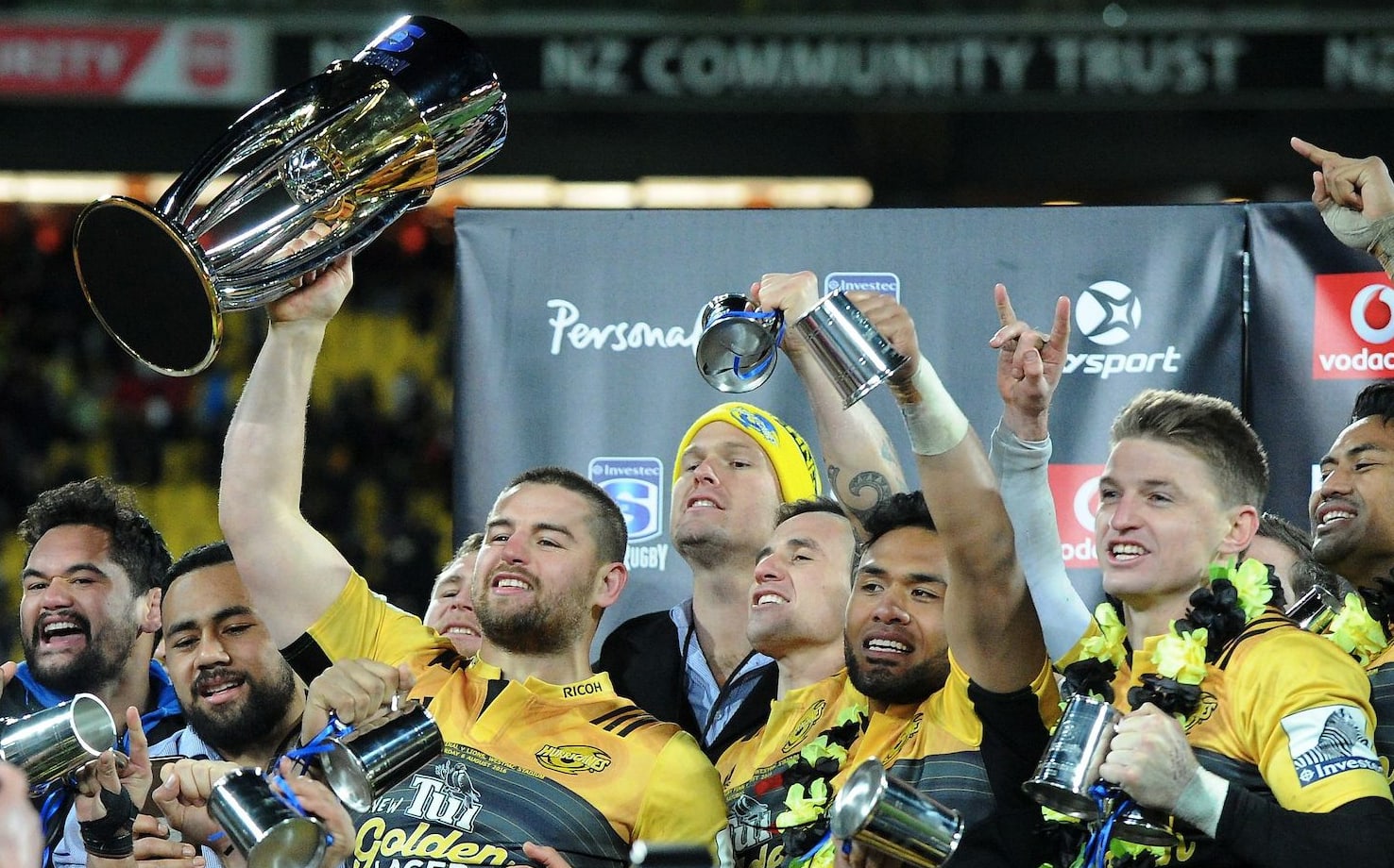 Hurricanes captain Dane Coles with the Super Rugby trophy following the win over the Lions in Wellington.