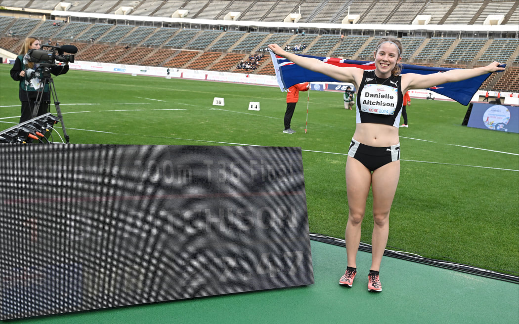 New Zealand sprinter Danielle Aitchison breaks a world record in winning gold at the 2024 World Para Athletics World Championships in Japan.