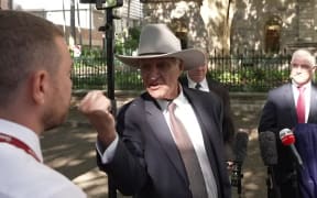 Australian MP Bob Katter threatened a reporter with his fist.