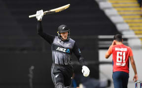 Martin Guptill celebrates his 50 during the New Zealand Black Caps v England Twenty20 Cricket match at Eden Park. Auckland, New Zealand.
