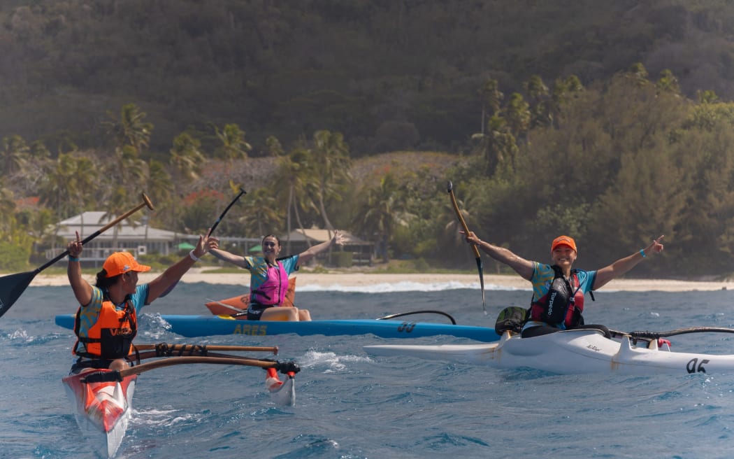 Vaka Eiva competitors are racing in the open ocean.