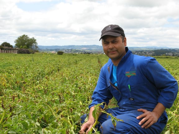 Bharat Jiven in a potato paddock that will disappear