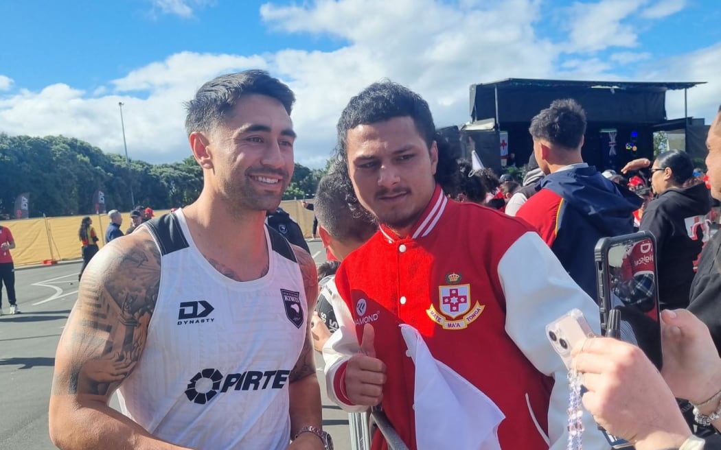 Mate Ma'a Tonga fan with Kiwi star Shaun Johnson said outside the main Mount Smart Stadium on Wednesday. 30 October 2024