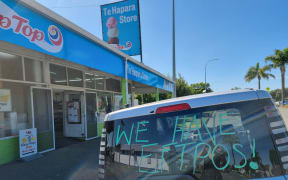 A dairy with an eftpos sign on the Pacific Coast Highway in Gisborne