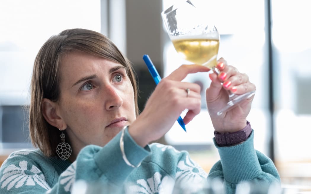 Denise Garland judging in the New World Beer & Cider Awards in 2022.