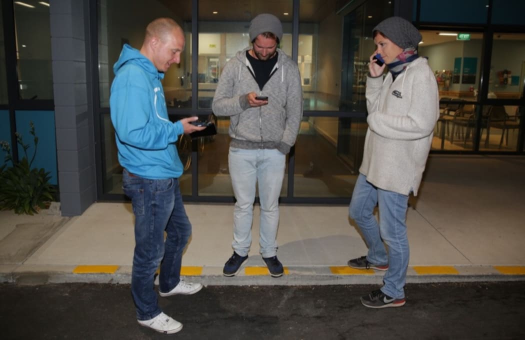 Tourists attempt to make contact with their family after the quake.