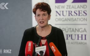 Nurses reject pay offer, vote to strike