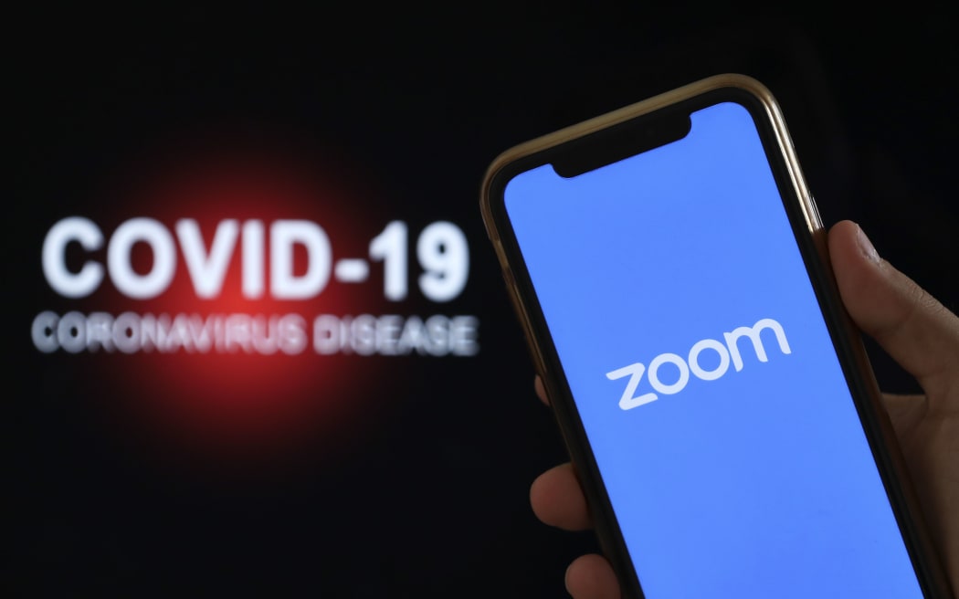 Zoom logo on a mobile phone screen.