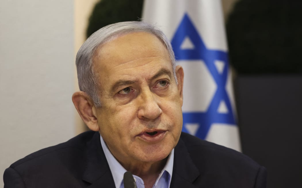 Israeli Prime Minister Benjamin Netanyahu heads the weekly cabinet meeting at the Defence Ministry in Tel Aviv on January 7, 2024. (Photo by RONEN ZVULUN / POOL / AFP)