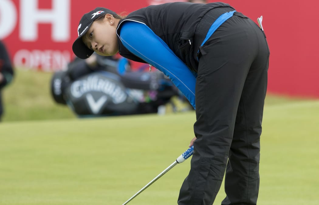 Lydia Ko watches a putt at the British Open, 2015.