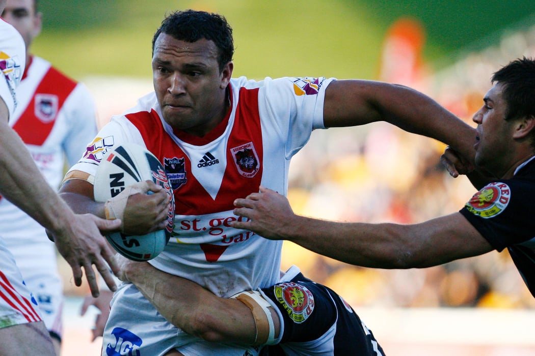 Former PNG Kumuls and Queensland prop Neville Costigan playing for the Dragons in 2009.