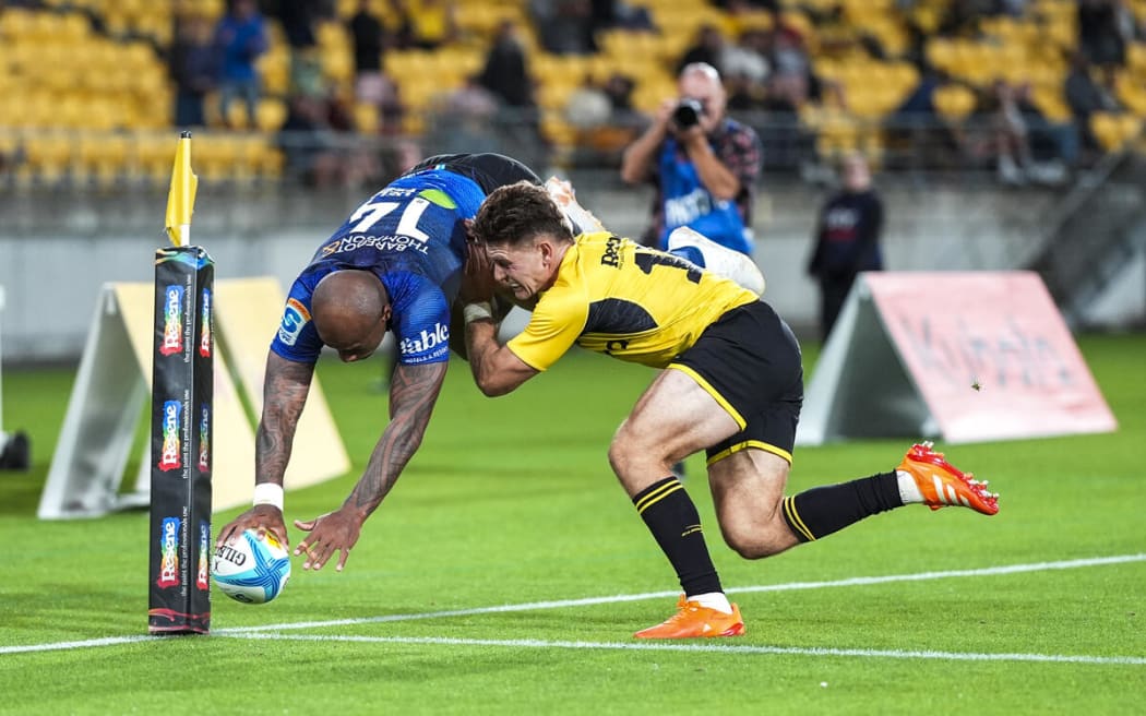 Blues Mark Tele'a scores in the corner.