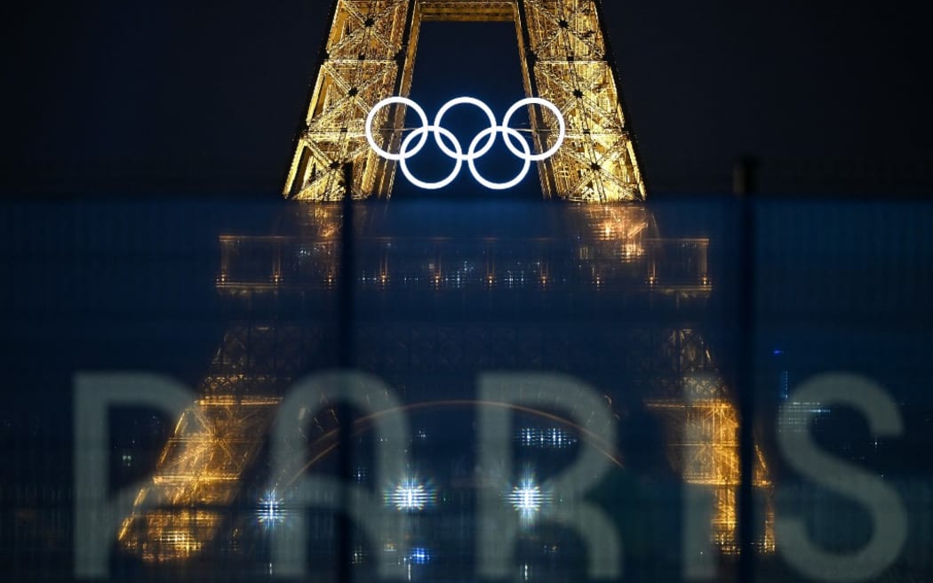 The Eiffel Tower bearing the Olympics rings, lit-up ahead of the Paris 2024 Olympic and Paralympic games, in Paris on 20 July 20, 2024.