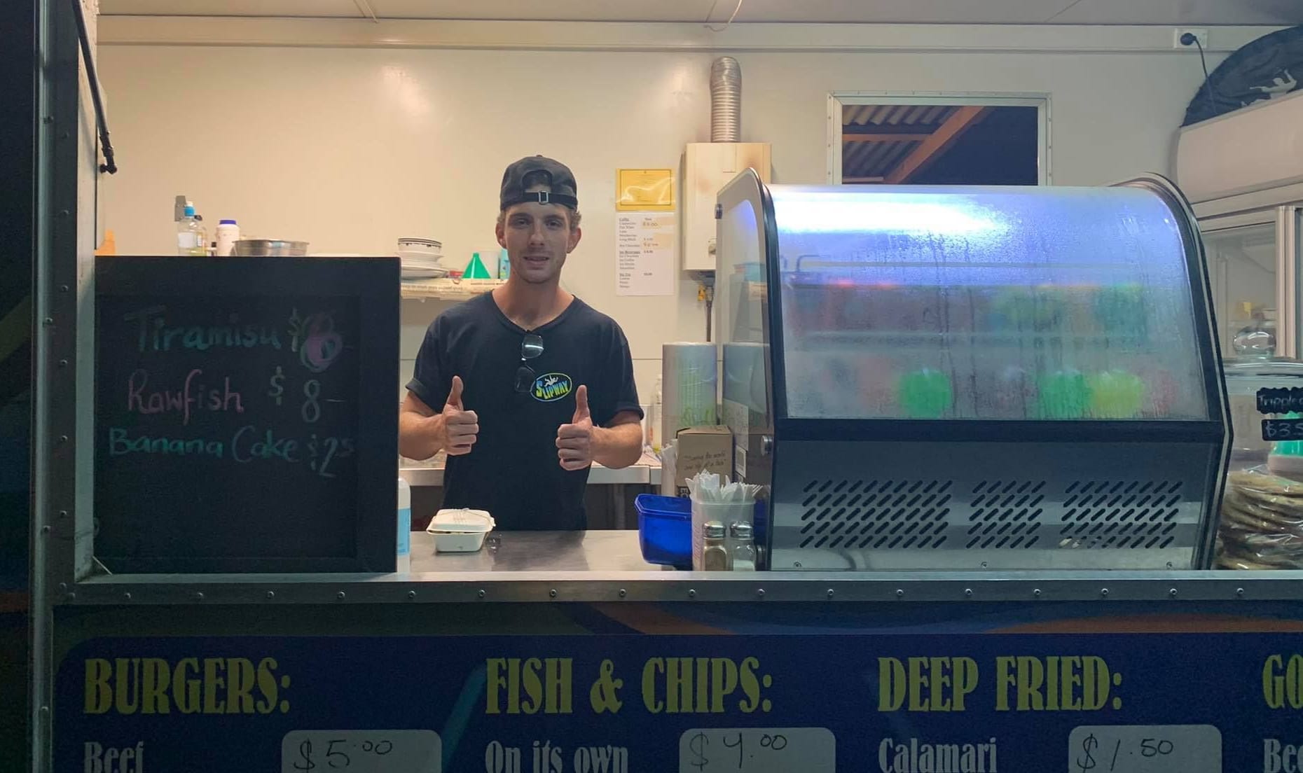 Duncan Robati owns a cooking spot by the wharf at Avatiu