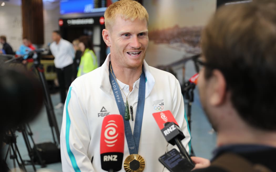 Olympic athlete Finn Butcher speaks to RNZ after returning home from Paris Olympics.