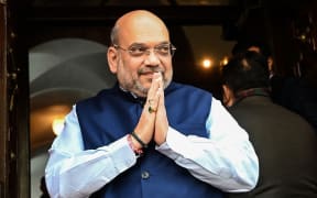 (File photo) India's Home Minister Amit Shah on 1 February arriving at Parliament House, New Delhi.