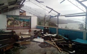 A damaged chapel in Ranwadi Secondary School overlooks a devastated Pentecost landscape.Cyclone Harold, Vanuatu 2020.