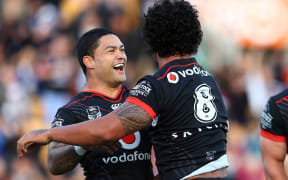 Warriors James Gavet and Issac Luke celebrate in their winning game against the Sydney Roosters at Mt Smart Stadium.