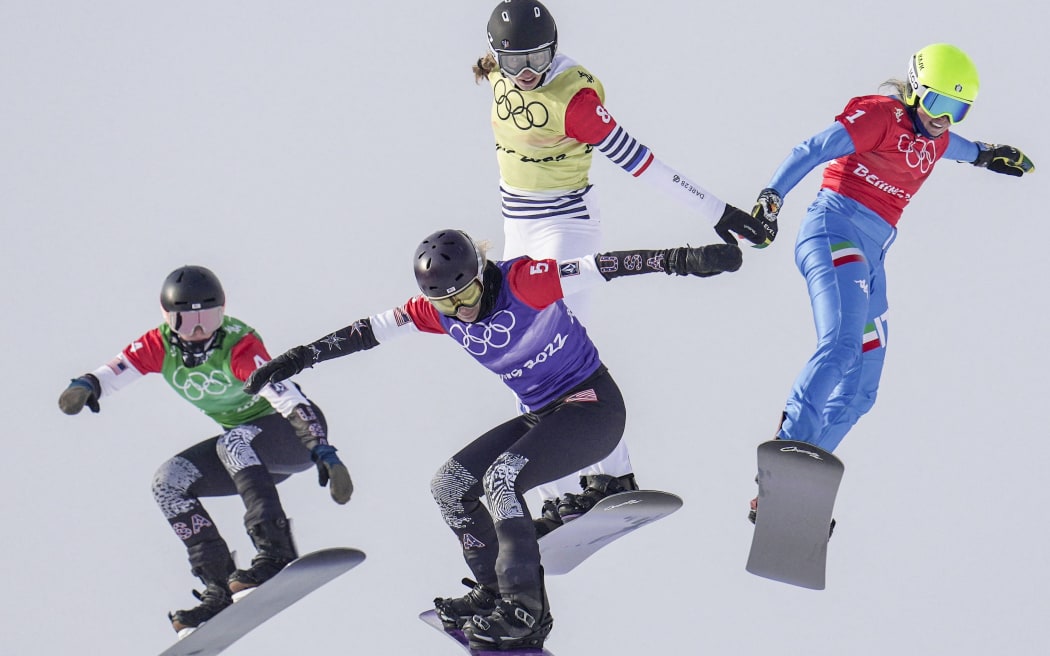 (220209) -- ZHANGJIAKOU, Feb. 9, 2022 (Xinhua) -- Stacy Gaskill and Lindsey Jacobellis of the United States, Chloe Trespeuch of France, Michela Moioli of Italy (L to R) compete during the women's snowboard cross semifinal of the Beijing 2022 Winter Olympics at Genting Snow Park in Zhangjiakou,