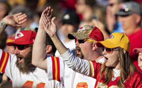 NASHVILLE, TN - NOVEMBER 10: Fans of the Kansas City Chiefs do the tomahawk chop in the second half of a game against the Tennessee Titans at Nissan Stadium on November 10, 2019 in Nashville, Tennessee. The Titans defeated the Chiefs 35-32.   Wesley Hitt/Getty Images/AFP (Photo by Wesley Hitt / GETTY IMAGES NORTH AMERICA / Getty Images via AFP)