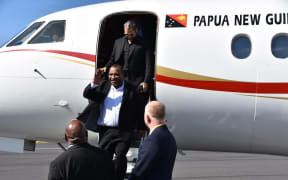 James Marape arriving in New Zealand.