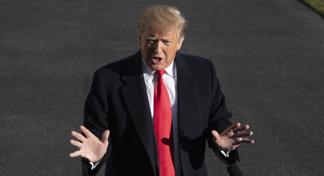 US President Donald Trump speaks to the media as he arrives at the White House in Washington, DC, on January 6, 2019, after meetings at Camp David.