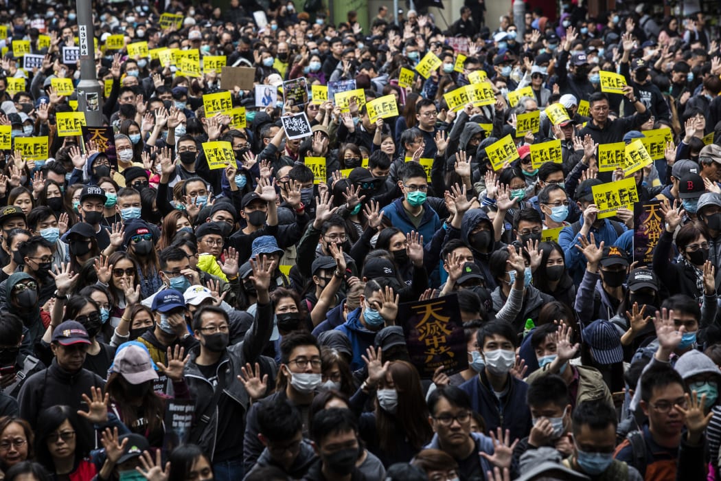 Pro-democracy protesters gather in Victoria Park ahead of a planned march in Hong Kong on January 1, 2020.