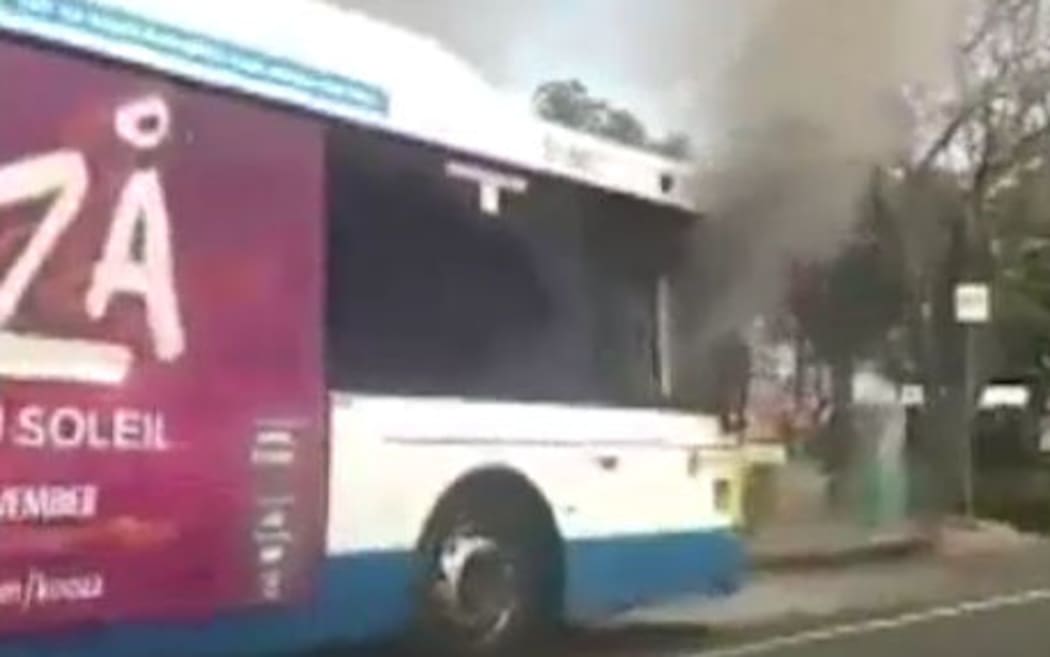 The bus was engulfed in smoke after the driver was set on fire.
