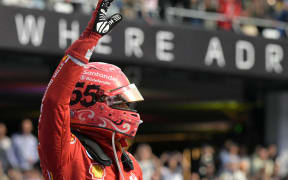 Ferrari's Spanish driver Carlos Sainz celebrates after winning the Mexico City Formula One Grand Prix.