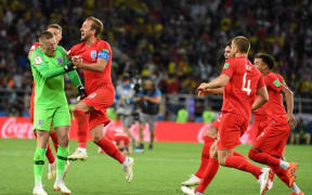 England's players celebrate after winning the penalty shootout at the end of the Russia 2018 World Cup
