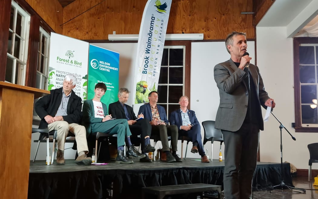 From left, Nelson mayoral candidates Kerry Neal, Rohan O'Neill-Stevens, Richard Osmaston, Tim Skinner, Nick Smith with Matt Lawrey speaking.