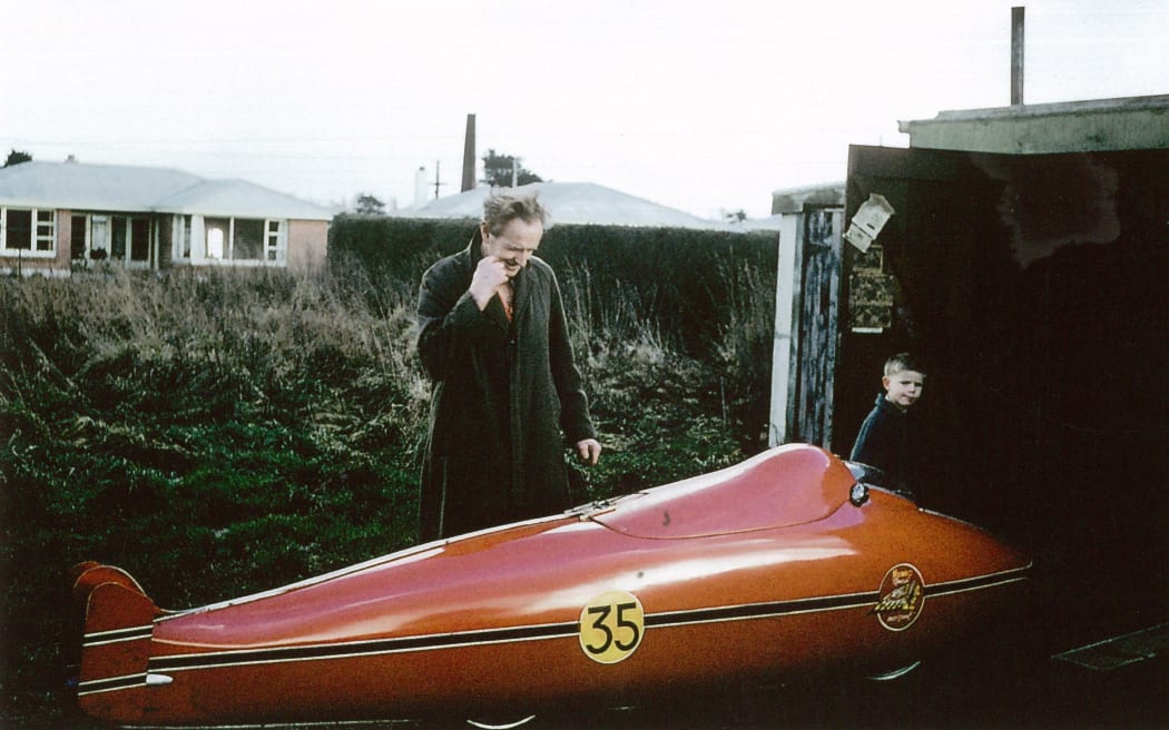 Burt Munro in Invercargill in 1962 preparing to pack up the Indian inside it’s Streamliner to send to Bonneville. Also pictured: a young Neville Hayes, now the Managing Director of E Hayes and Sons Invercargill, and the owner of Burt’s Indian