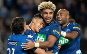 Blues Roger Tuivasa-Sheck celebrates his try with Sam Nock, Hoskins Sotutu and Mark Telea   during the Quarter Final the Super Rugby Paci?c rugby match between the Blues and the Highlanders held at Eden Park - Auckland - New Zealand.   04  June  2022       Photo: Brett Phibbs / www.photosport.nz