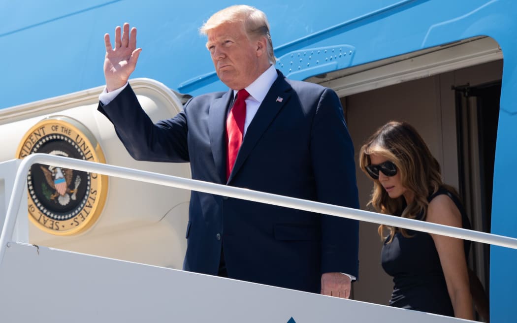 US President Donald Trump and First Lady Melania Trump disembark from Air Force One upon arrival at El Paso International Airport following last weekend's mass shootings.