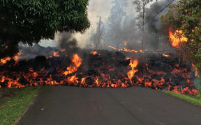 A lava flow moves on Makamae Street in Leilani Estates.