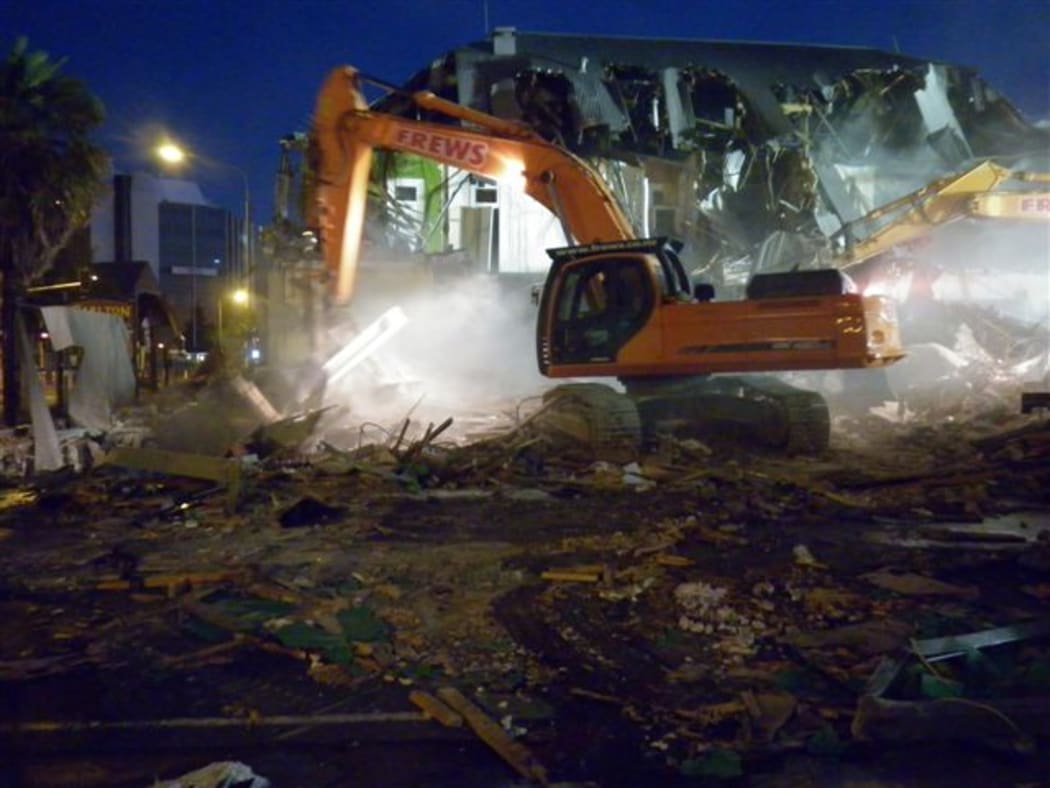 A digger demolishes part of the Carlton Hotel (Tim Graham)