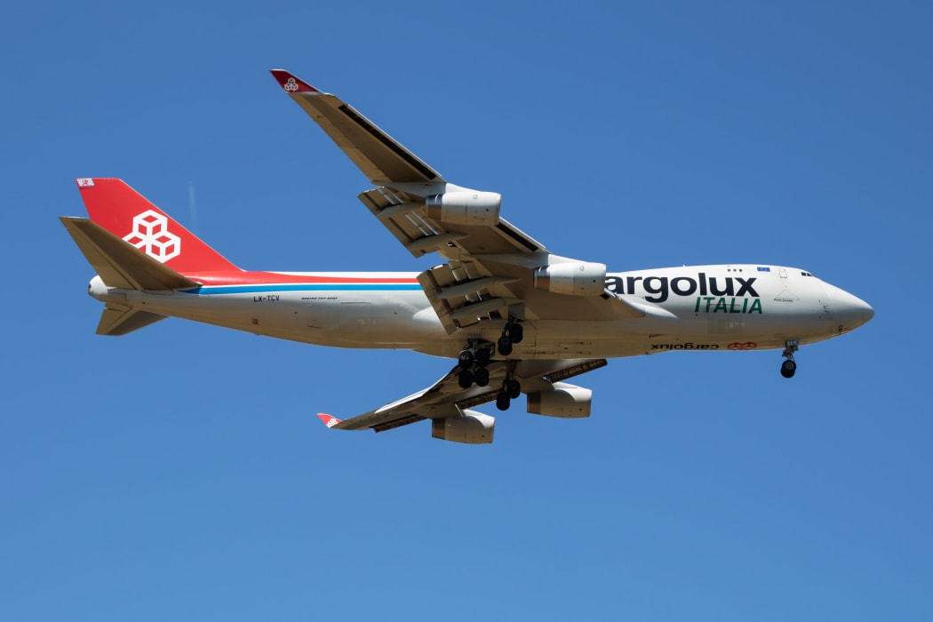 The man risked his life by stowing in the wheel area of a plane believed to be a Cargolux Italia cargo flight.