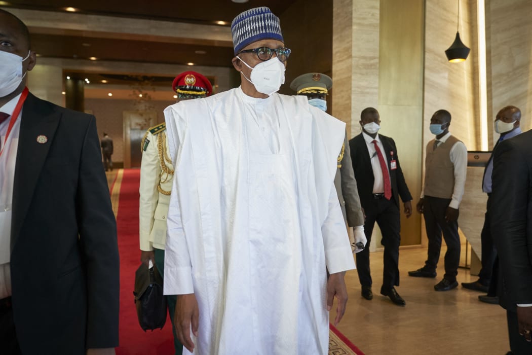President of Nigeria Muhammadu Buhari arrives in Bamako on July 23, 2020, where West African leaders will gather in a fresh push to end an escalating political crisis in the fragile state of Mali.