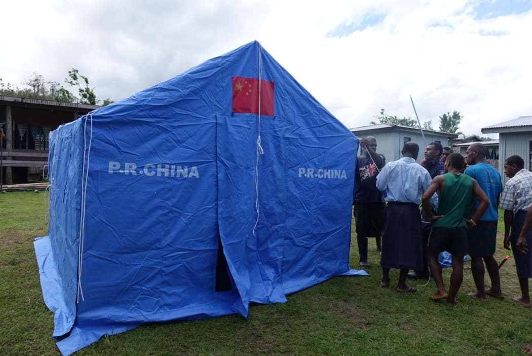 Tents donated by China were flown into villages in Fiji by the NZ Defence Force after Cyclone Winston. This one is in Nawaisomo village, Fiji.