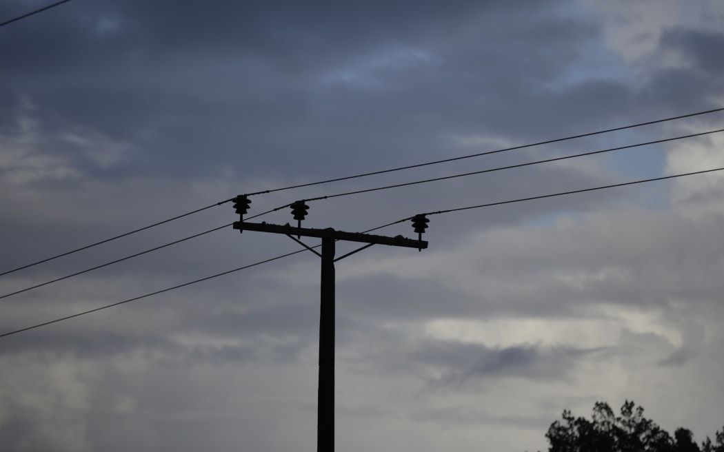 Powerlines on a cloudy sky